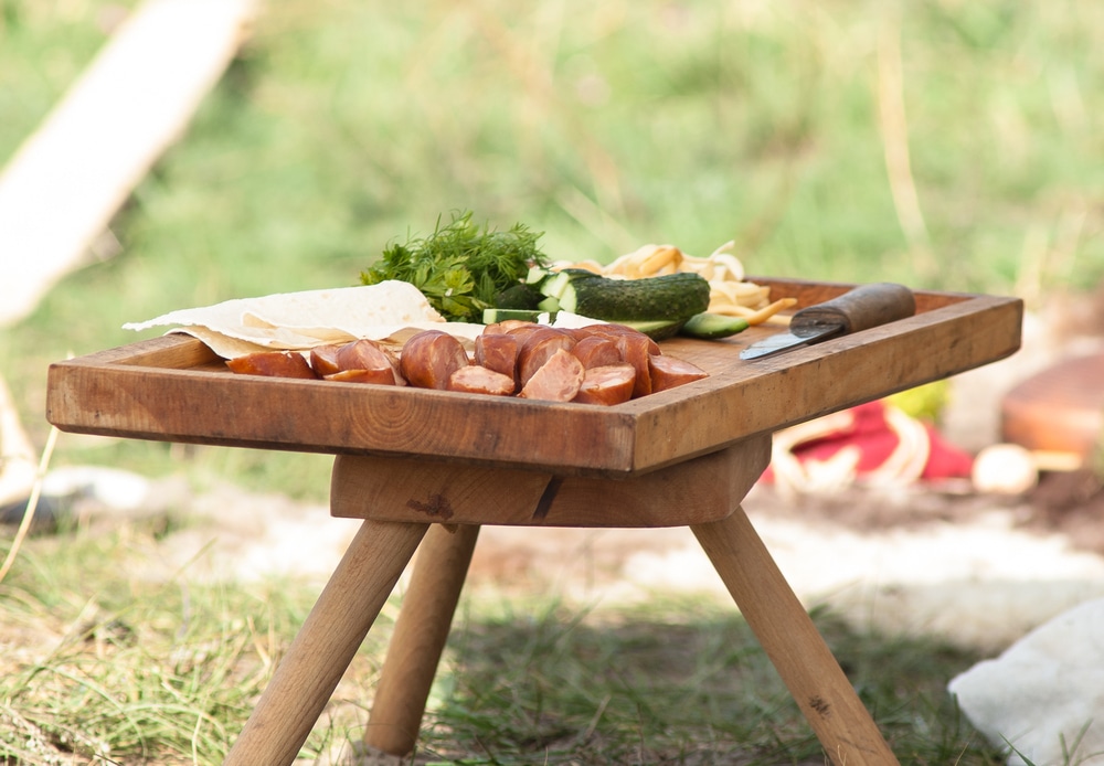 The Food Plated on a Miniature Picnic Table